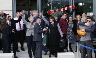 Relatives sing "You'll never walk alone" after the jury delivered its verdict at the new inquests into the Hillsborough disaster, in Warrington, Britain
