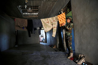 2016-05-04T130310Z_811510956_S1BETCCMUGAB_RTRMADP_3_MIDEAST-CRISIS-IRAQ-FEMALE-FIGHTERS.JPG