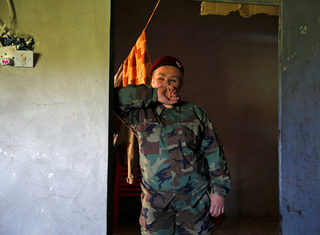 2016-05-04T130423Z_426948229_S1BETCCMXBAC_RTRMADP_3_MIDEAST-CRISIS-IRAQ-FEMALE-FIGHTERS.JPG