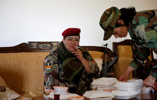 2016-05-04T130450Z_1534250898_S1BETCCMYCAA_RTRMADP_3_MIDEAST-CRISIS-IRAQ-FEMALE-FIGHTERS.JPG