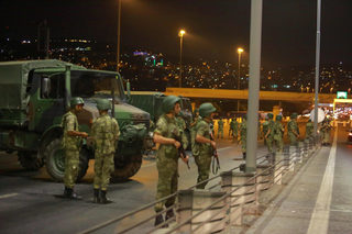 Turkish military block access to the Bosphorus bridge, which links the city's European and Asian sides, in Istanbul