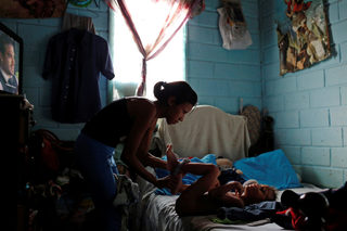 The Wider Image: In crisis-hit Venezuela young women seek sterilization