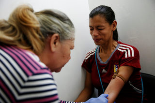 The Wider Image: In crisis-hit Venezuela young women seek sterilization