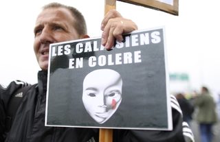 2016-09-05T112024Z_1346503491_LR1EC950VHQ3F_RTRMADP_3_EUROPE-MIGRANTS-CALAIS-PROTEST.JPG