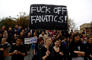 People take part in abortion rights campaigners' demonstration "Black Protest" in front of the Parliament in Warsaw