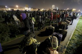 2016-10-24T055548Z_1734796654_LR1ECAO0GGPG6_RTRMADP_3_EUROPE-MIGRANTS-CALAIS.JPG