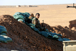 2016-11-03T165724Z_1502541722_S1BEUKSWXWAD_RTRMADP_3_MIDEAST-CRISIS-MOSUL-WOMENFIGHTERS.JPG