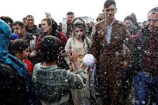 2017-02-16T170920Z_919918738_RC1E59AEF450_RTRMADP_3_MIDEAST-CRISIS-MOSUL-WEDDING.JPG