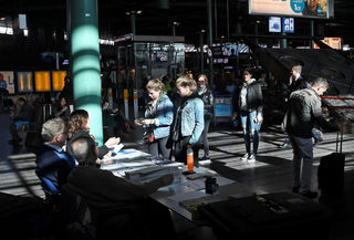 People vote during the general election in a polling station at Schiphol Airport