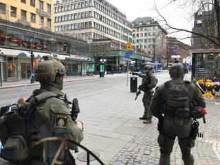Sweden's police officers guard in the central Stockholm