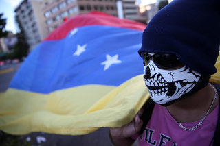 2017-03-31T232338Z_1872597807_RC18F5D03E30_RTRMADP_3_VENEZUELA-POLITICS.JPG