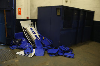 Seats and signage dismantled from the stadium after the game
