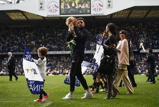 Tottenham's Kyle Walker applauds fans during the ceremony after the game