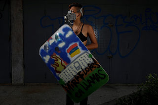 The Wider Image: Venezuela's shield-bearing protesters