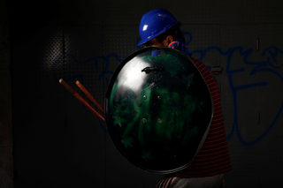 The Wider Image: Venezuela's shield-bearing protesters