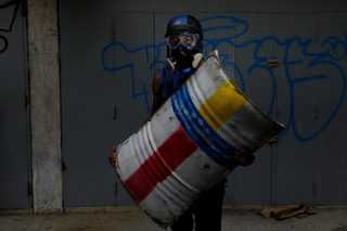 The Wider Image: Venezuela's shield-bearing protesters