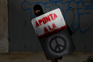 The Wider Image: Venezuela's shield-bearing protesters