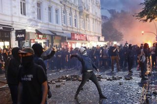 2017-07-07T203824Z_1509579703_UP1ED771LBZ56_RTRMADP_3_G20-GERMANY-PROTEST.jpg