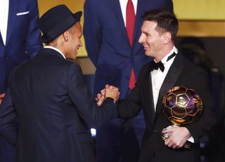 Messi of Argentina shakes hand with Neymar'of Brazil after receiving the World Player of the Year award during the FIFA Ballon d'Or 2015 ceremony in Zurich