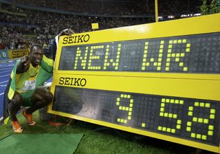 Usain Bolt of Jamaica celebrates after winning the men's 100 metres final during the world athletics championships at the Olympic stadium in Berlin