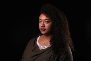 Siyobin Blanco, 23, poses for a #MeToo portrait in Detroit
