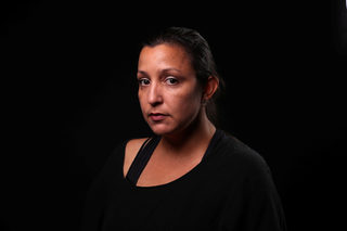 Jennifer Childs, 39, poses for a #MeToo portrait in Detroit