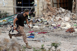 2017-11-10T184913Z_1002892630_RC18F10EDFB0_RTRMADP_3_LIBYA-SECURITY-VIOLENCE.JPG