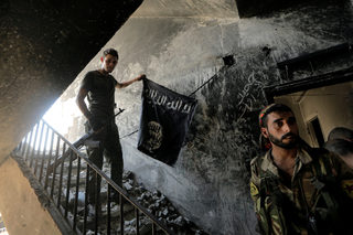 2017-12-04T161726Z_414507808_RC122F3475F0_RTRMADP_3_GLOBAL-POY-ISLAMIC-STATE.JPG
