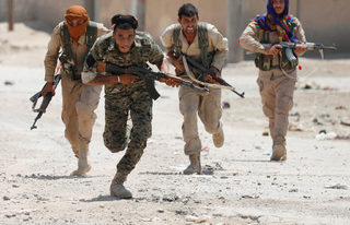 2017-12-04T161727Z_1648382769_RC1BC3C5F210_RTRMADP_3_GLOBAL-POY-ISLAMIC-STATE.JPG