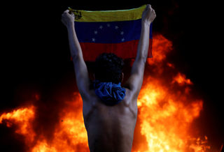 2017-11-30T122747Z_1960776829_RC1241412BB0_RTRMADP_3_GLOBAL-POY-VENEZUELA.JPG