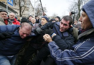 2017-12-05T092037Z_1839956096_UP1EDC50PYCJ1_RTRMADP_3_UKRAINE-SAAKASHVILI.JPG