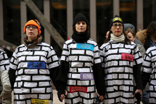 2018-01-21T000454Z_1501132737_RC12F13EF5B0_RTRMADP_3_USA-TRUMP-WOMEN.JPG