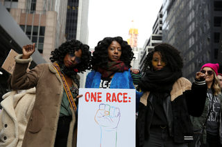 2018-01-20T235630Z_1300609573_RC1A55B1FA50_RTRMADP_3_USA-TRUMP-WOMEN.JPG