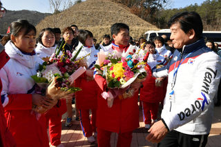 North Korean women's ice hockey players arrive at the South Korea's national training center on January 25, 2018 in Jincheon, South Korea