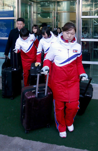 North Korea's women ice hockey athletes arrive at the South's CIQ (Customs, Immigration and Quarantine), just south of the demilitarized zone separating the two Koreas in Paju