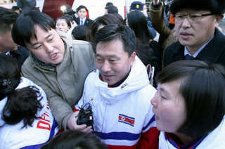 Coach of North Korea's women ice hockey team arrives at the South's CIQ (Customs, Immigration and Quarantine), just south of the demilitarized zone separating the two Koreas in Paju