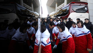 North Korea's women ice hockey athletes arrive at the South's CIQ (Customs, Immigration and Quarantine), just south of the demilitarized zone separating the two Koreas in Paju