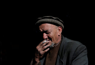2018-01-31T080527Z_631406218_RC159770D830_RTRMADP_3_AFGHANISTAN-BIRDMARKET.JPG