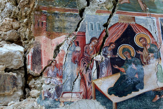 A damaged fresco is pictured in The Orthodox Church of Saint Athanasios in Leshinca