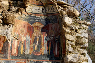 A damaged fresco is pictured in The Orthodox Church of Saint Athanasios in Leshinca
