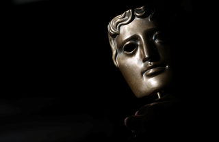 2018-02-07T142605Z_1995324029_RC1EBEF308A0_RTRMADP_3_AWARDS-BAFTA-MASKS.JPG