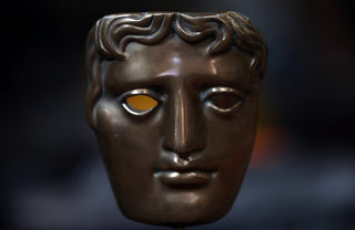 2018-02-07T142648Z_2042902042_RC1D38F05E90_RTRMADP_3_AWARDS-BAFTA-MASKS.JPG