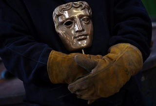 2018-02-07T142635Z_23212257_RC1873BAAB60_RTRMADP_3_AWARDS-BAFTA-MASKS.JPG