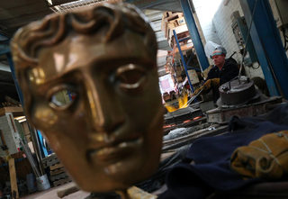 2018-02-07T142755Z_99584963_RC1835FCF000_RTRMADP_3_AWARDS-BAFTA-MASKS.JPG