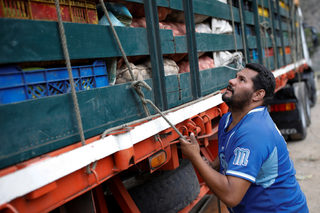2018-02-09T110438Z_1154871183_RC171EBDDDA0_RTRMADP_3_VENEZUELA-ECONOMY-TRUCKS.JPG