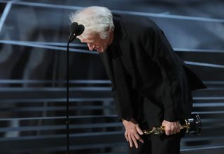 2018-03-05T035050Z_145230244_HP1EE350AOP0P_RTRMADP_3_AWARDS-OSCARS-SHOW.JPG