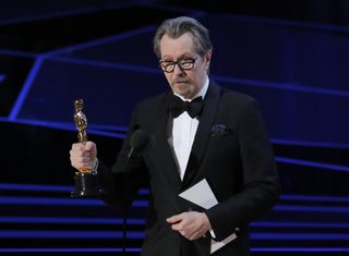 2018-03-05T042922Z_1789611173_HP1EE350CGX6Y_RTRMADP_3_AWARDS-OSCARS-SHOW.JPG