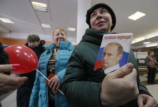 2018-03-18T060445Z_964109955_UP1EE3I0GVWBG_RTRMADP_3_RUSSIA-ELECTION.JPG
