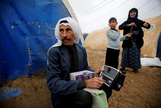 2018-03-28T130810Z_2104407557_RC12DAD9A520_RTRMADP_3_IRAQ-MOSUL-DISPLACED-RETURN.JPG