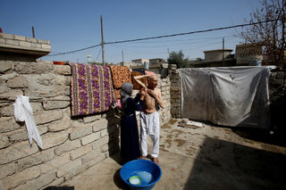 2018-03-28T130855Z_1897227722_RC1B83E64320_RTRMADP_3_IRAQ-MOSUL-DISPLACED-RETURN.JPG